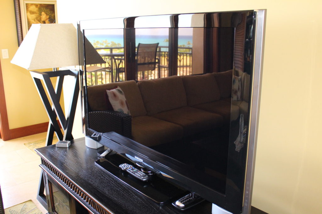 Samsung TV on top of Baik Designs - Black Rubbed TV Console